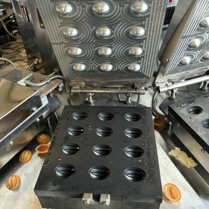 Équipement de production automatique de fonds de tarte et de biscuits
